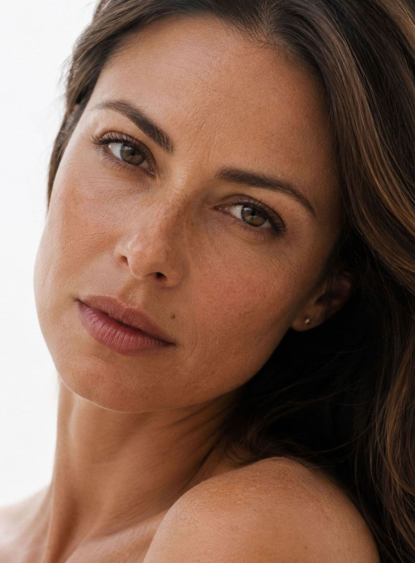 A woman looking toward the camera
