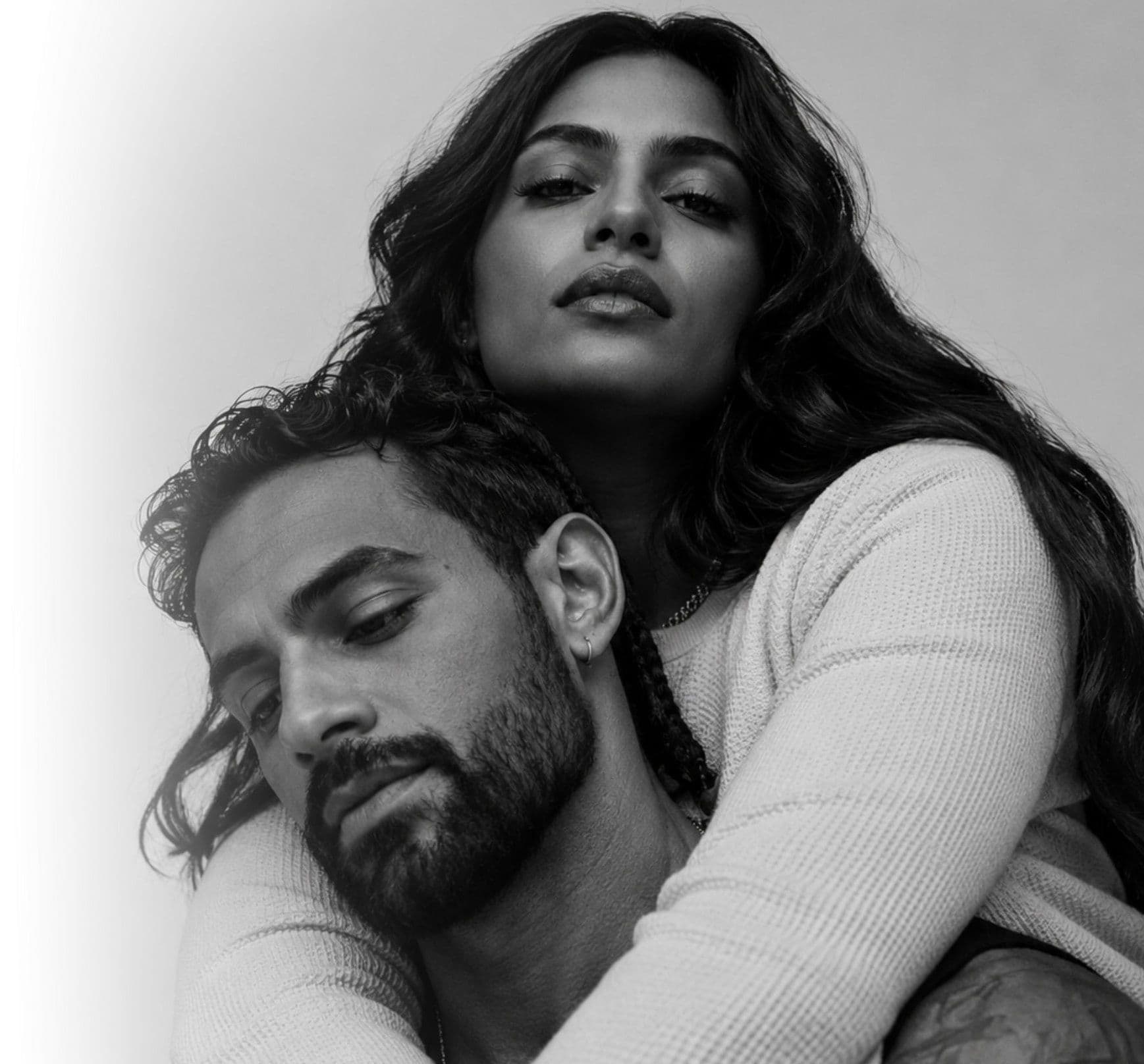 A couple embracing, black and white