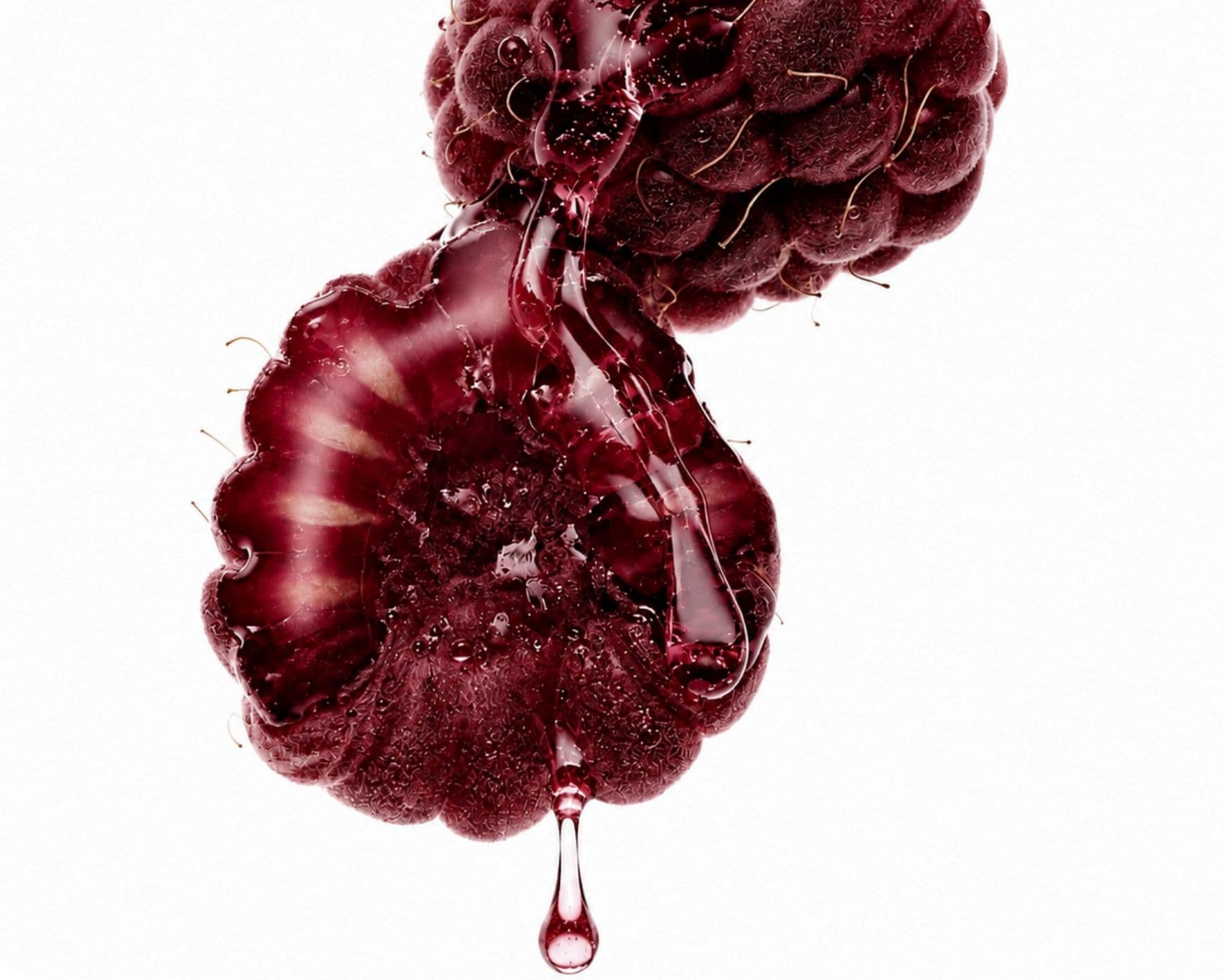 A drop of deep red serum