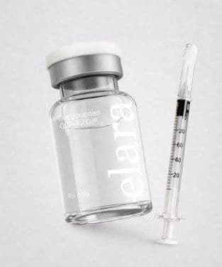 An Elara compounded GLP-1/GIP vial with an insulin syringe