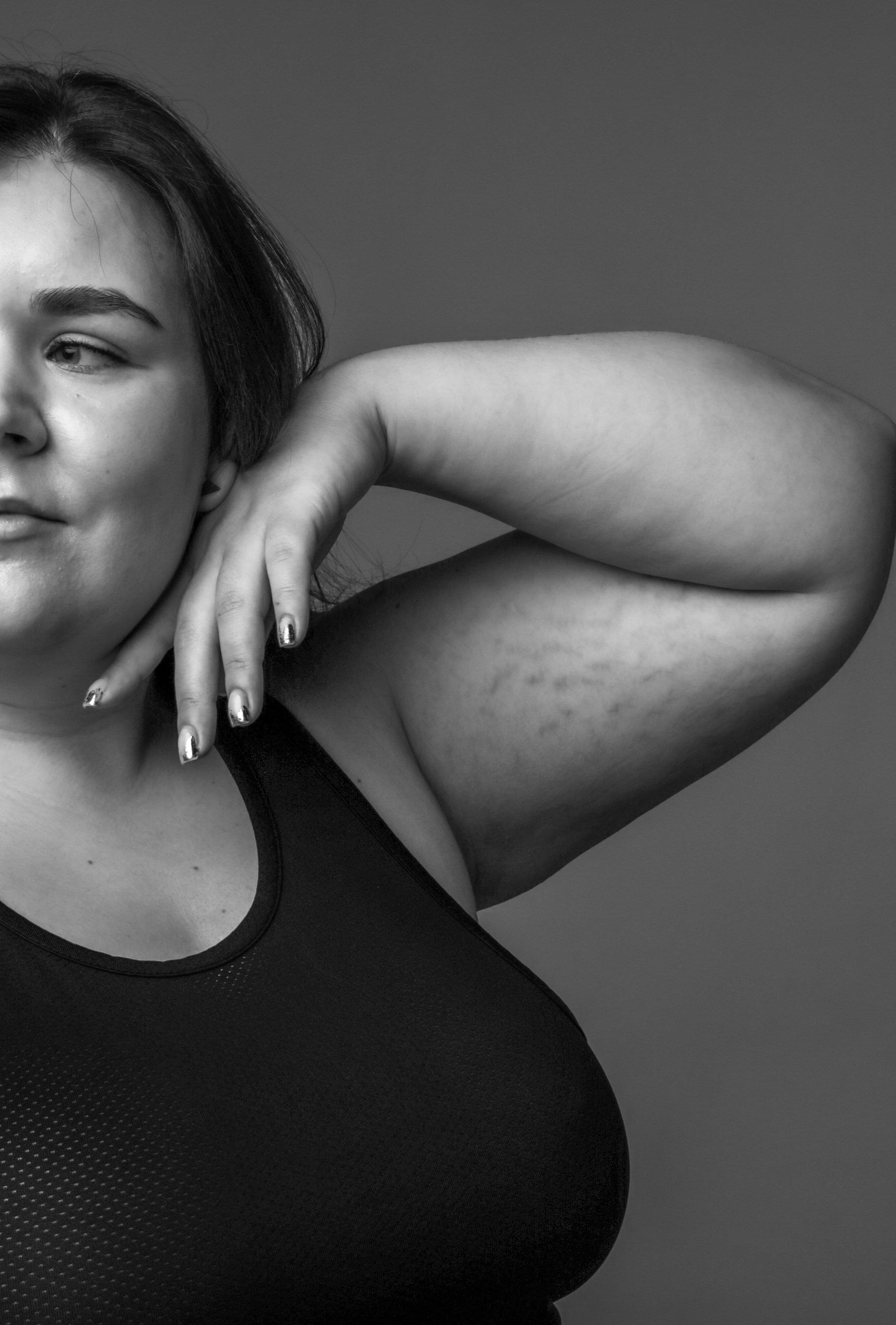 A black and white portrait of a woman, opening a comparison of tirzepatide and semaglutide for PCOS