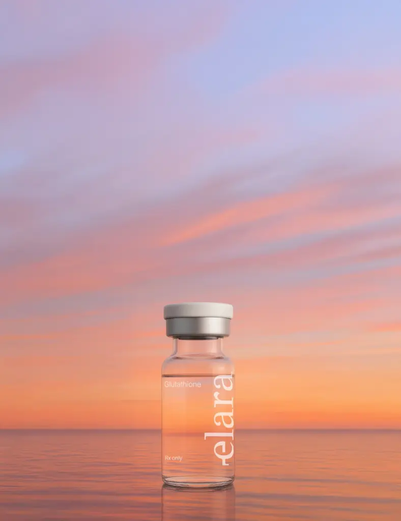 Elara glutathione injection vial placed on a reflective surface