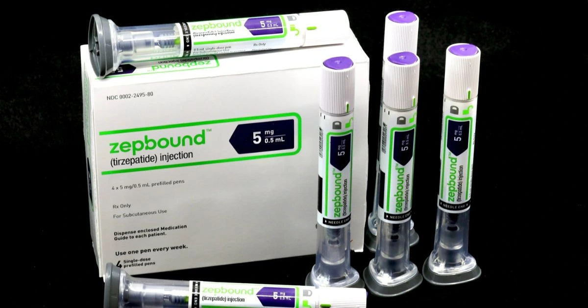 Close-up of a patient administering the Zepbound injectable pen, illustrating the method of delivery for weight loss medication.